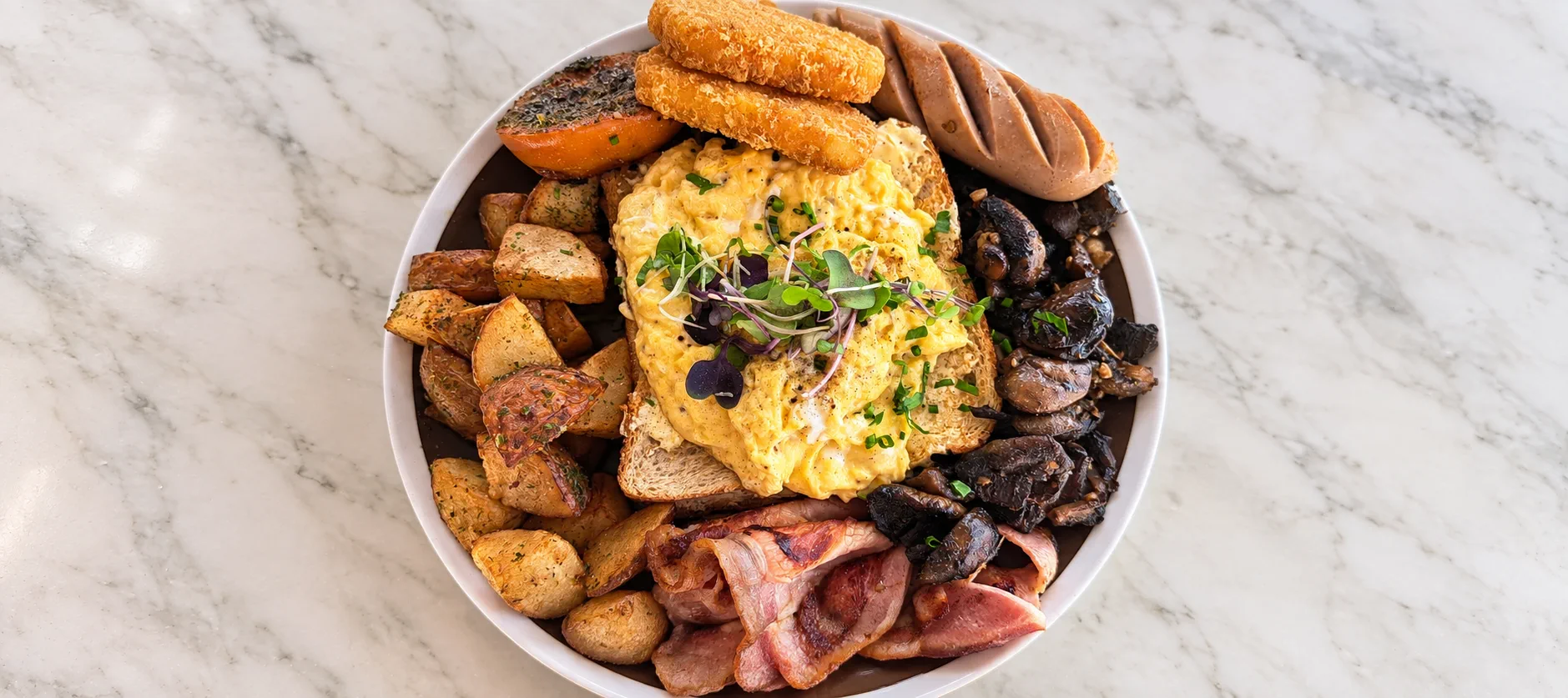 A generous breakfast plate served at Zone Cafe